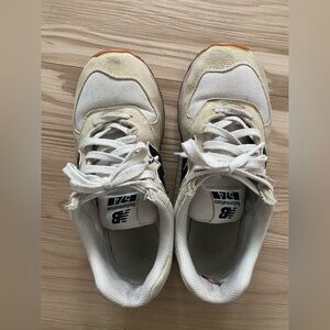 New Balance 574 Women’s Sneakers in Cream and Tan with navy Logo